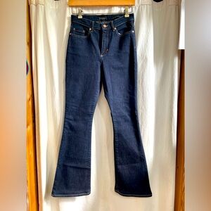 High rise, form fitting, flare dark blue jeans